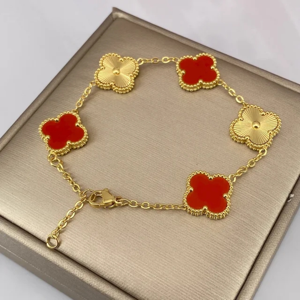 Elegant Gold and Red Clover Bracelet
